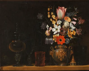 Still life with a bouquet of flowers and glass goblets