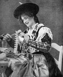 A woman creatively peeling a potato, 1922