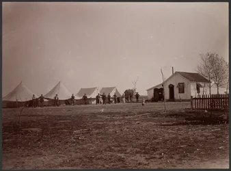 Tents with Figures and House