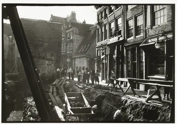 Construction Workers in and on a Construction Pit at Nieuwendijk in Amsterdam