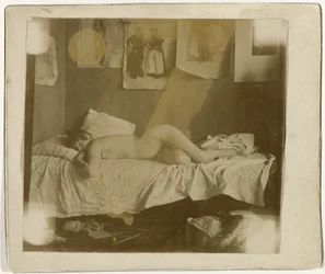 Marie Jordan lying nude on a bed