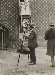 A man holding tutti poles during the Hocktide Festival in Hungerford