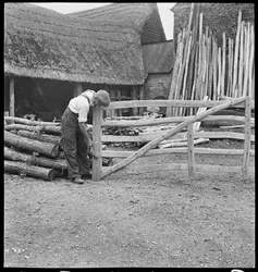 A man making a field gate in Aston, 1930-50