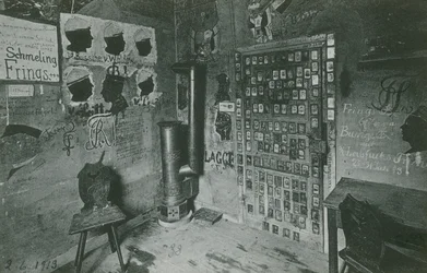 A Room with Walls Covered in Graffiti Referring to Important Contemporary Figures Such as Bussche and Waldow. Postcard Sent in 1913.