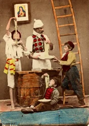 Children eat the spaghetti with hands, Naples