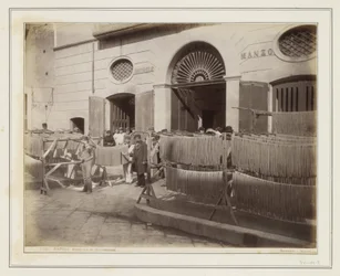 Street Scene in Naples with the Shop of Pasta Maker Michele Manzo and Pasta Drying Racks