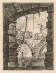 The Prisons: A Lofty Arch with a Frieze