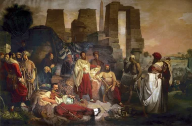 Egyptologist Jean Francois Champollion seated in the center, surrounded by Ippolito Rosellini and Gaetano Rossellini