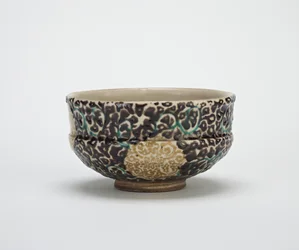 Tea bowl with silk brocade design, mid 19th century