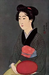 A Japanese waitress with a tray