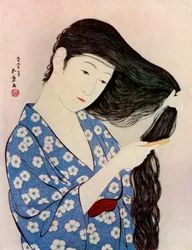 A Japanese Woman Combing Her Hair