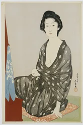 A Beauty in a Black Kimono with White Hanabishi Patterns, Seated Before a Mirror