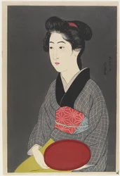 Woman Holding a Tray