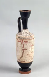 Attic White Ground Lekythos Depicting a Young Girl Presenting a Funerary Offering, c.420 BC