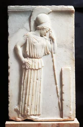 Bas-relief depicting mourning Athena standing in front of a stele