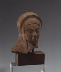 Female Head, Fragment of a Statue of the Spedos Crossed Arms Type