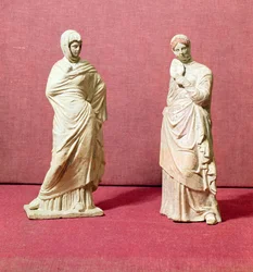 Two statues of standing women, from Tanagra