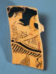 Fragment of Attic plate depicting Apollo flying on a swan to the country of the Hyperboreans