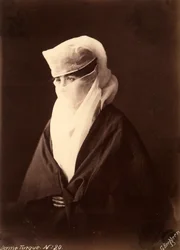 Turkish woman with her face covered by a chador