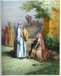 Eliezer and Rebekah - Eliezer, the servant of Abraham, is offered a drink of water by Rebekah - Eliezer and Rebecca - engraving in The Bible illustree by Gustave Dore - Engraving from The Dore Bible