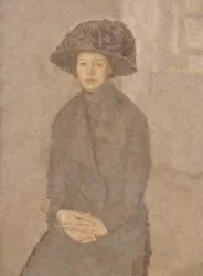 Young Woman Wearing a Large Hat