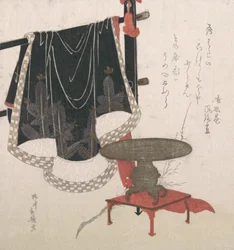 Flower Vase with Stand, Dress Hanging on a Clothesrack
