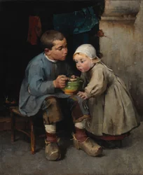 A Boy Feeding his Little Sister