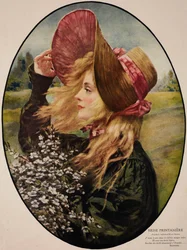 Young woman wearing straw hat, holding bunch of flowers