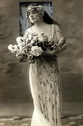 Full-length portrait of Lucy Arbell, French opera singer, in costume