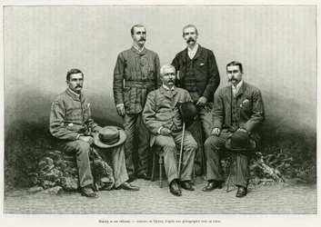 Portrait of Henry Morton Stanley surrounds his officers from the left: Dr. Thomas Heazle Parke, Robert H. Nelson, William G. Stairs, and Arthur J. M. Jephson. Engraving to illustrate the story Dans les tenebres de l