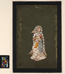 A standing woman in a floral-patterned white sari, a peacock-plume-patterned cloak