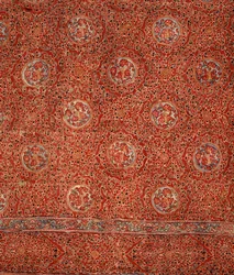 Fabric with a floral pattern and roundels within frames