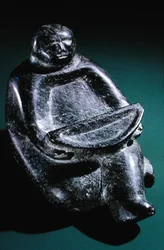 Figure holding offering bowl, from Cape Dorset
