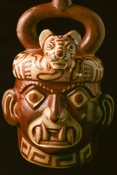 A fanged mouth ceramic artifact found at El Brujo