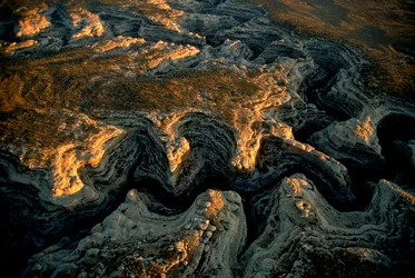 An aerial view of a parched Utah mesa- Grand Gulch delivered water to scores of small settlements