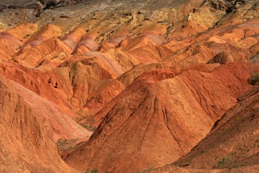 At the colored rocks near the campsite at Wu Cai Wan in the Gobi desert, Xinjiang..., 2007