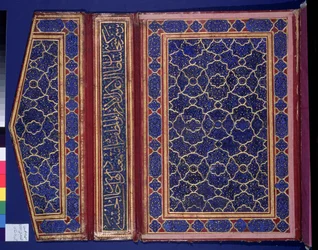 Inner face of a Koran case with a thulth inscription on the binding