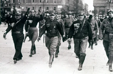 Black Shirts Walking on Rome