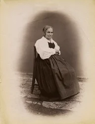 Elderly Woman Seated on Chair, Parre, Lombardy, Italy