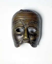 Bronze mask of the “Commedia dell
