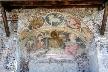 Deposition of Christ Between Virgin Mary, St John, with Evangelists Symbols and Agnus Dei on Arch