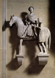 Saint Martin sharing his coat with a beggar