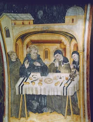 The miracle of the rain after the intervention of St. Scholastica during the meal with her brother, St. Benedict