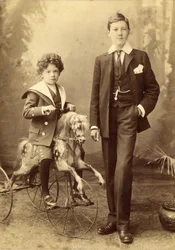 Young Boy on His Horse Mounted as a Tricycle, His Older Brother Alongside, 1880s