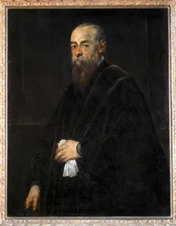 Portrait of an old man holding a handkerchief