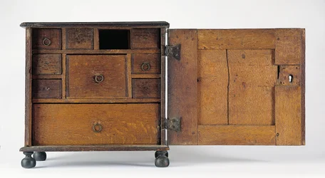 The Joseph and Bathsheba Pope Carved and Applied Valuables Cabinet