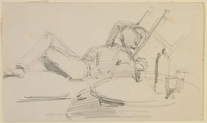 A man reclining on a bed