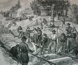Troops destroying a railroad track