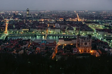 A view of Lyon between the Pont de la Feuillite, the Pont Bonaparte at twilight