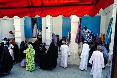 Market Outdoors in Muscat, Oman Merchants Display Textiles